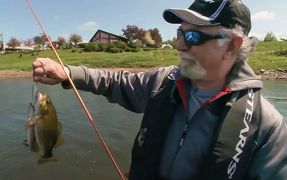 Angelo Viola with two New Brunswick bass on one lure on St John River