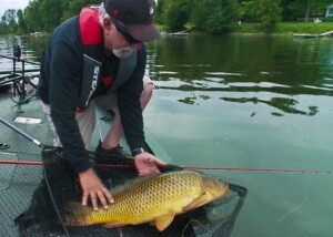 Fishing Carp From a Boat