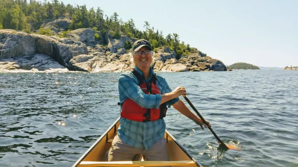 Kevin Paddling A Canoe