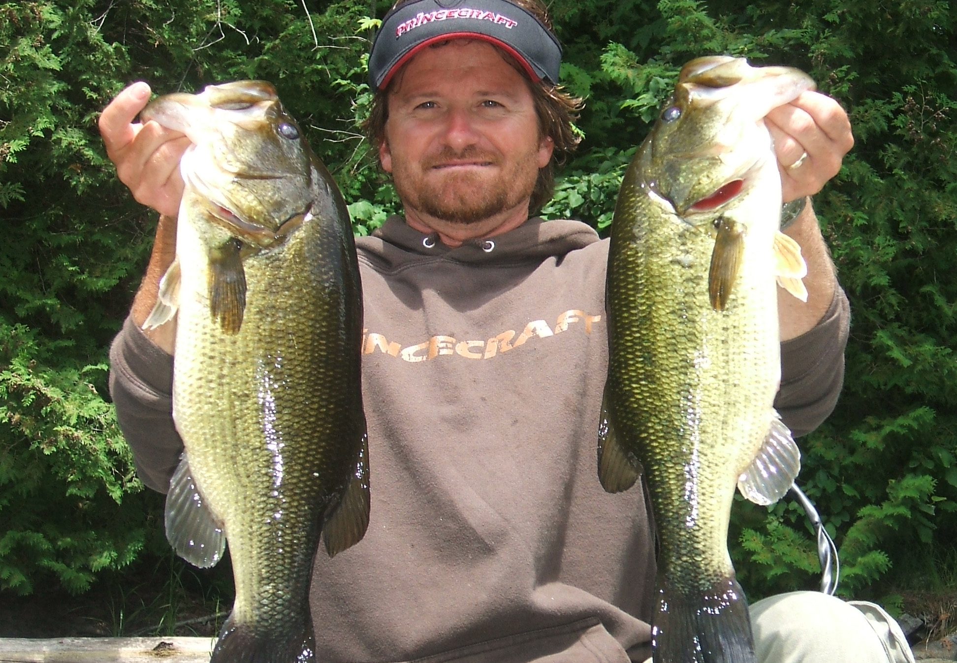 Pete Bowman with two big Bass.
