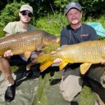 Pete and Will with a double-header of Otonabee River Carp.