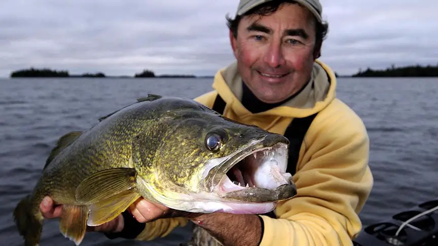 Gord Pyzer holding a walleye