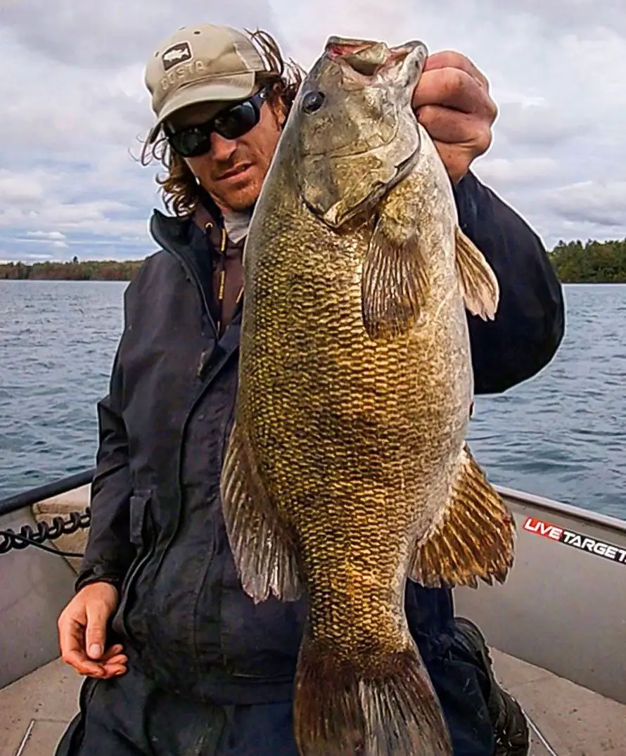Tyler Dunn holding a Lake Superior Smallmouth Bass