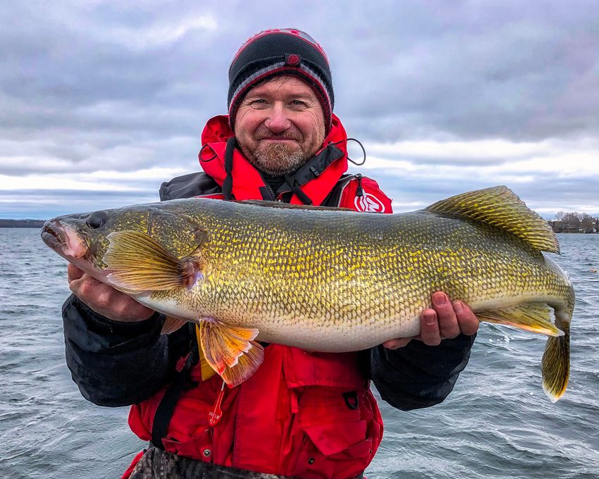 Pete Bowman with a late-fal Bay of Quinte Walleye caught underneath a Planer Board